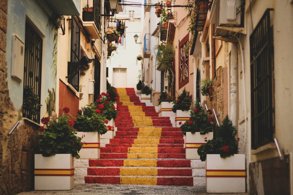 Espagne - red, yellow, and white concrete stairs