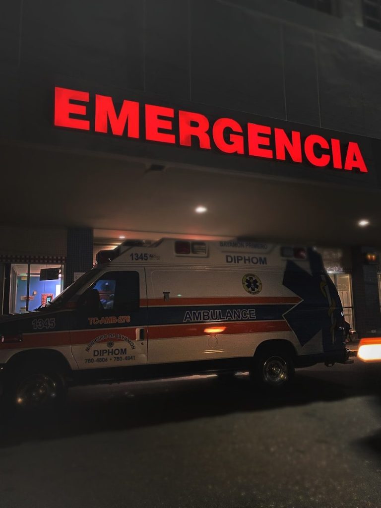white and red ambulance van